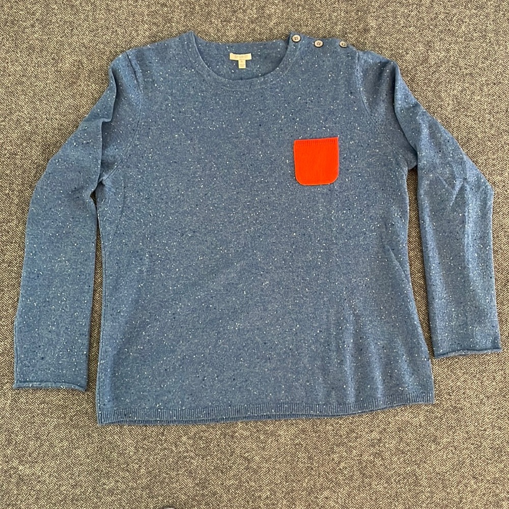 Blue cashmere sweater with tangerine orange pocket